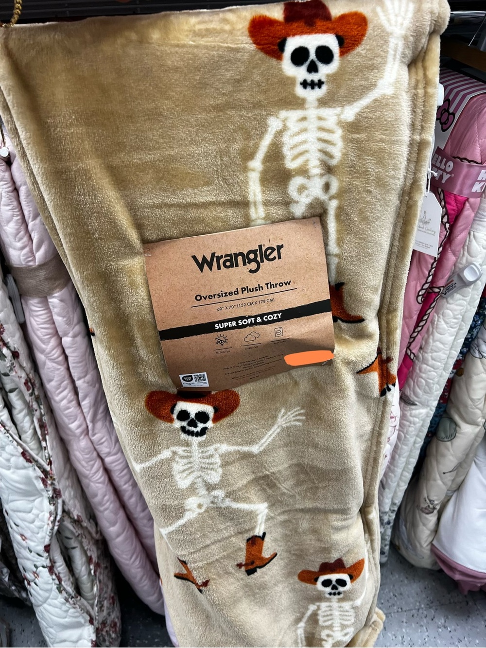Wrangler Tan Plush Throw with Skeleton Cowboy Pattern and Orange Hats
